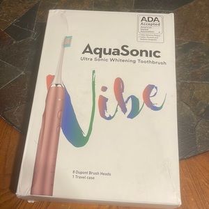Aqua sonic ultra sonic whitening tooth, brush